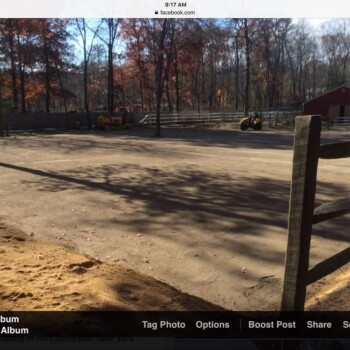Leveled equestrian arena riding surface
