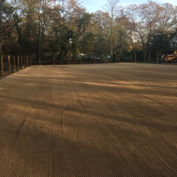 Flattened dirt riding surface for horses