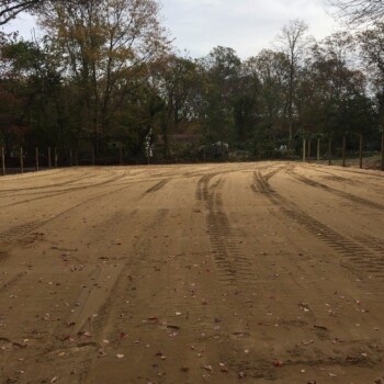 Riding arena with tractor tread marks